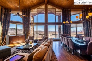 the living room with larger windows in a home in Banner Elk, NC